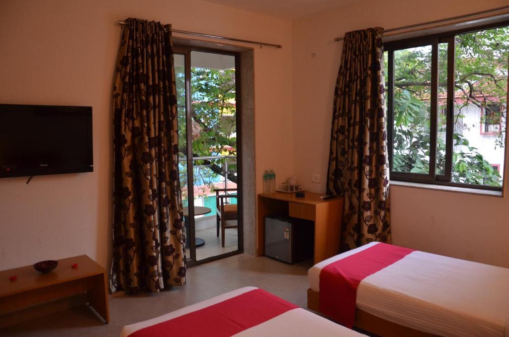 Hotel Sunkissed Plaza Calangute Habitación foto