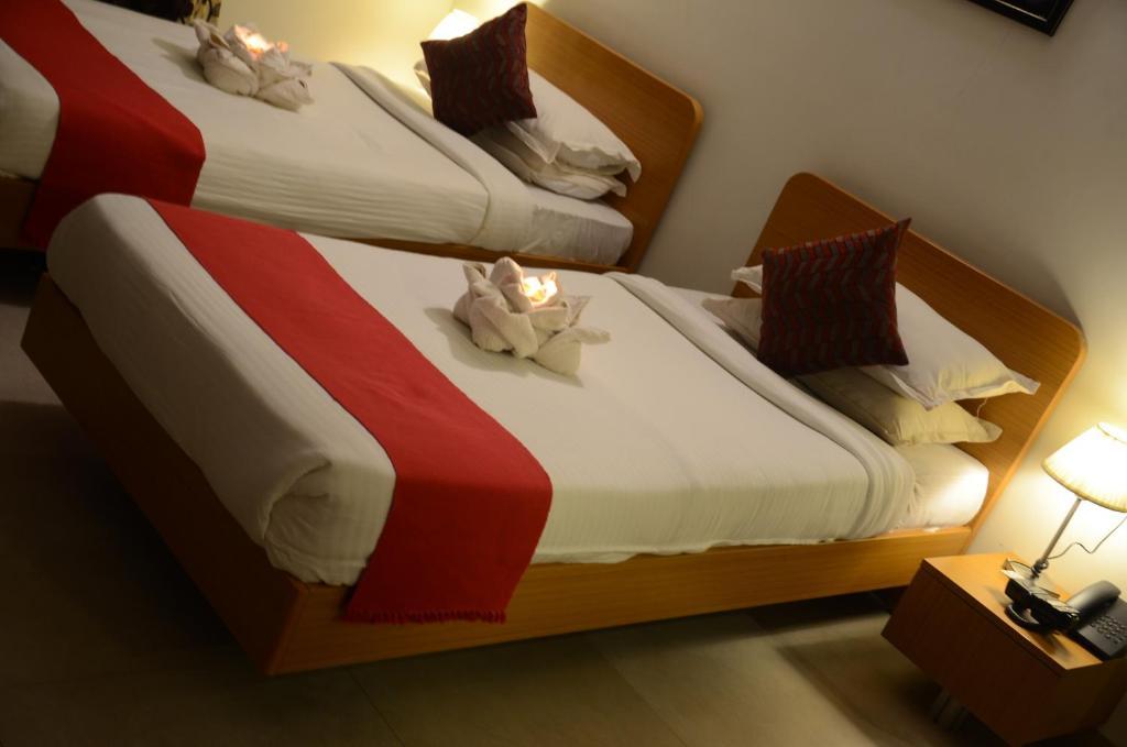 Hotel Sunkissed Plaza Calangute Habitación foto